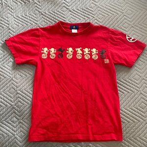 this is a red monkey shirt. Made with 100% Cotten! Very comfy and affordable!